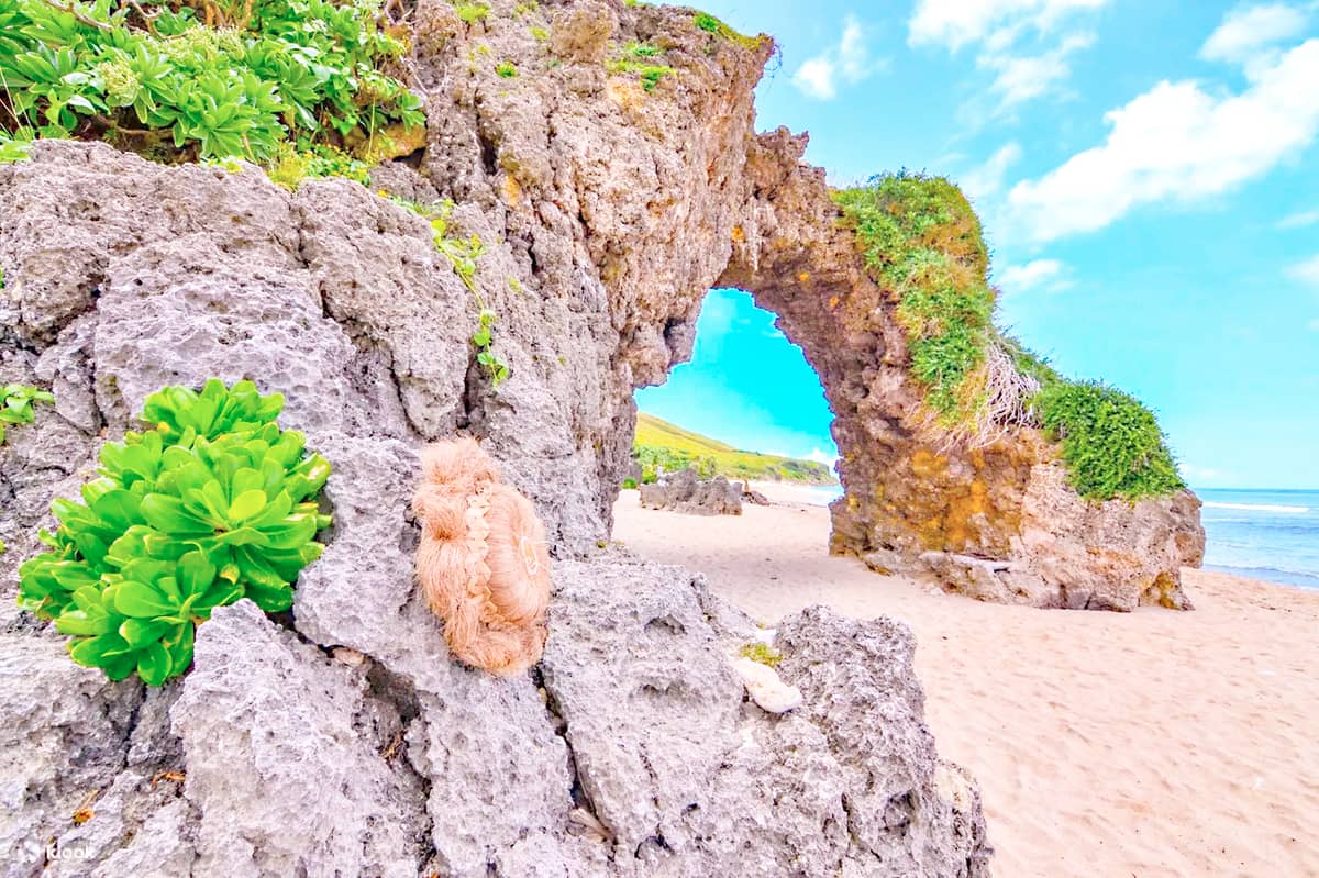 Nakabuang Arch, a rock formation known for its iconic placement at Morong Beach.